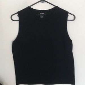 By Express.  Stretch black shell style top. Sz L